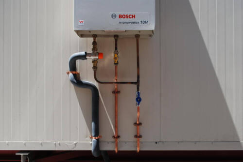 Happy Tappy Gallery Hot Water Unit Systems - Bosch Hydropower 10H Outdoor Setup and Configuration